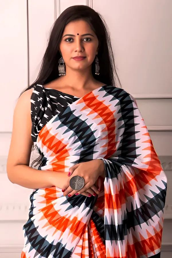 Bold_Geometric_Printed_Saree_Black_White_Orange_Statement_Drape