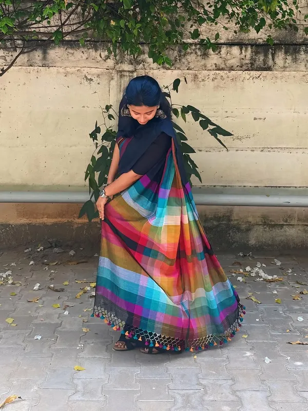 Elegant_Black_Linen_Cotton_Saree_With_Multicolor_Stripe_Border