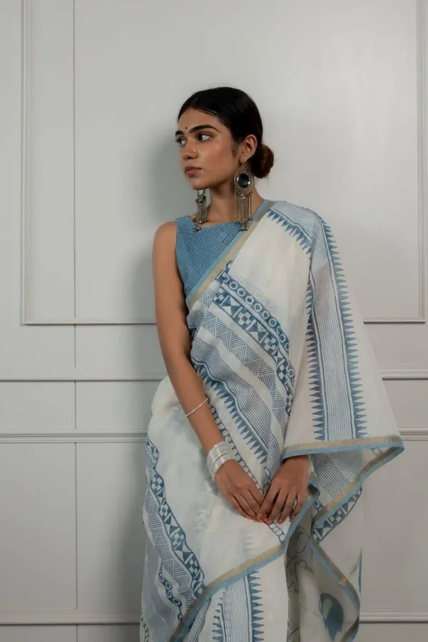Ivory_Sky_Blue_Geometric_Printed_Saree_With_Minimal_Ethnic_Border