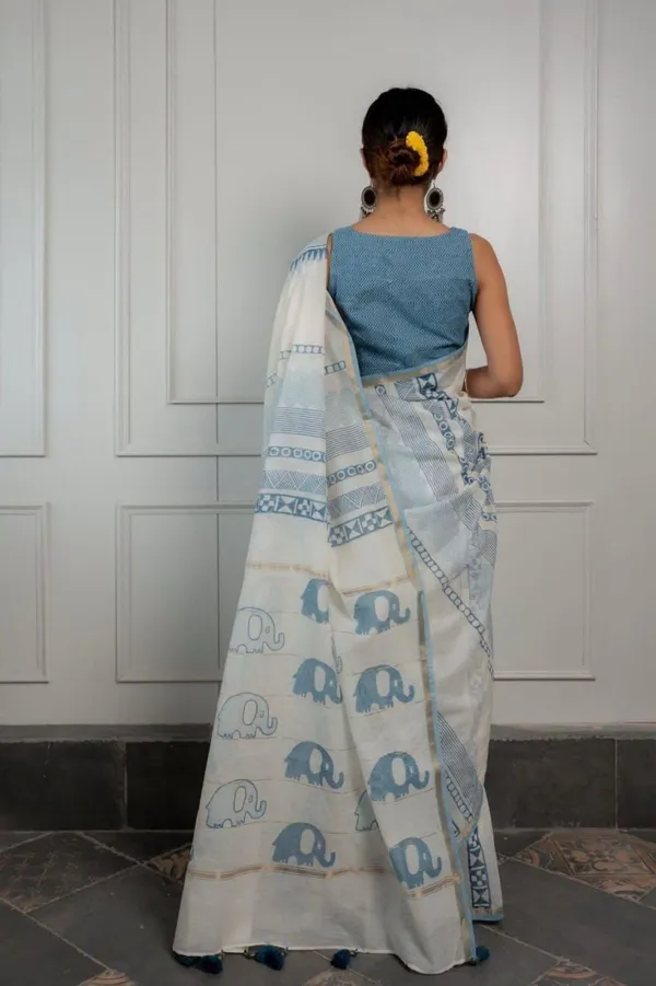Ivory_Sky_Blue_Geometric_Printed_Saree_With_Minimal_Ethnic_Border