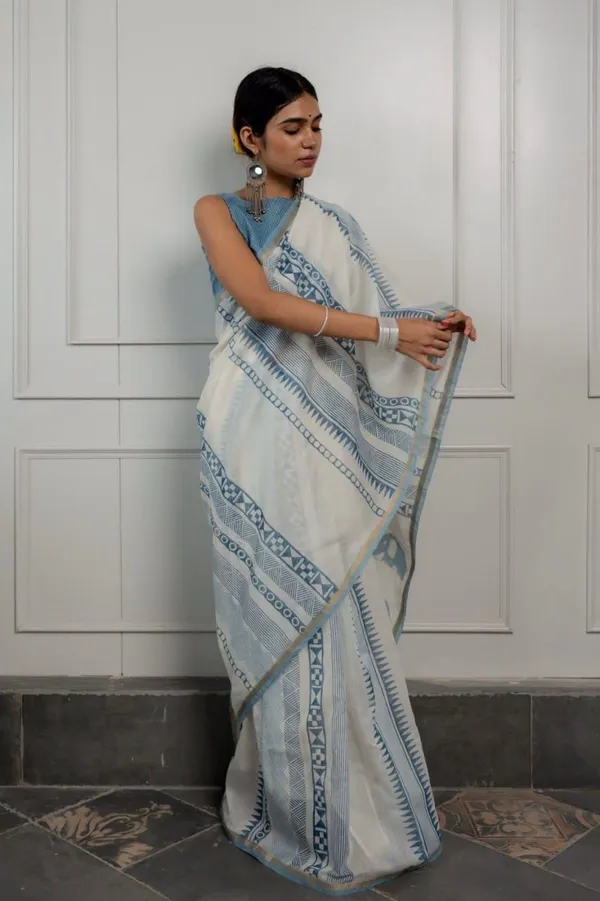 Ivory_Sky_Blue_Geometric_Printed_Saree_With_Minimal_Ethnic_Border
