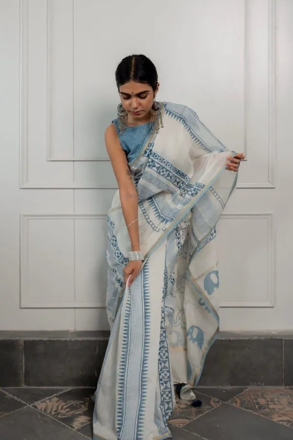 Ivory_Sky_Blue_Geometric_Printed_Saree_With_Minimal_Ethnic_Border