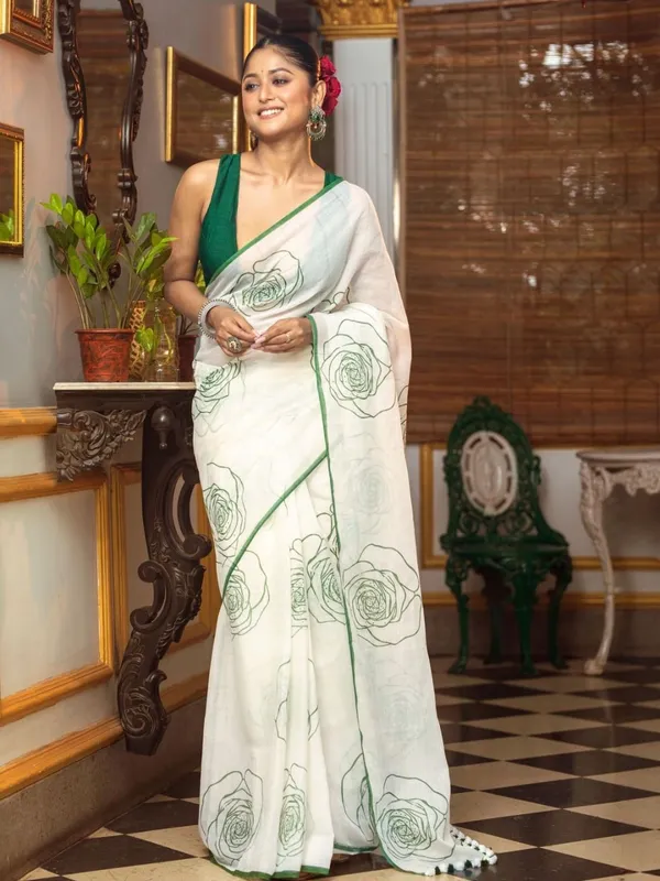 Elegant_White_Saree_With_Green_Floral_Line_Print_Minimal_Border