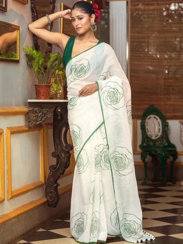 Elegant_White_Saree_With_Green_Floral_Line_Print_Minimal_Border