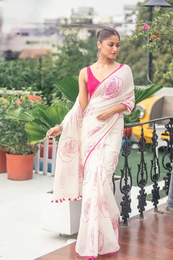 Elegant_White_Saree_With_Pink_Floral_Line_Print_Minimal_Border