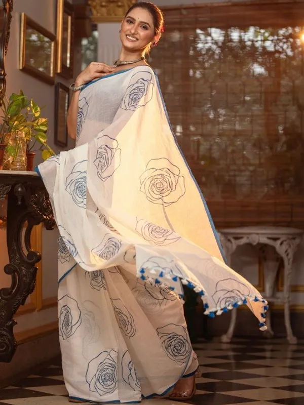 Elegant_White_Saree_With_Blue_Floral_Line_Print_Minimal_Border
