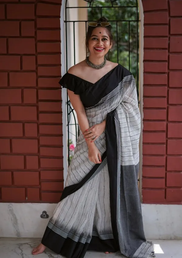 Classic_White_Black_Striped_Saree_With_Traditional_Border_Design