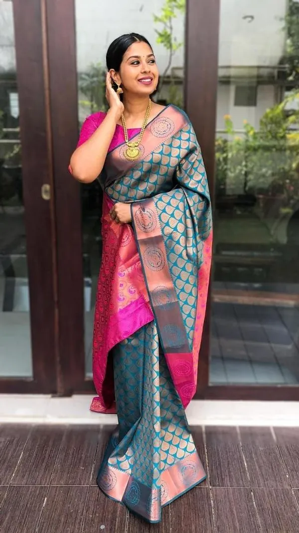 Peacock_Blue_And_Rani_Pink_Silk_Blend_Saree_With_Gold_Woven_Motifs