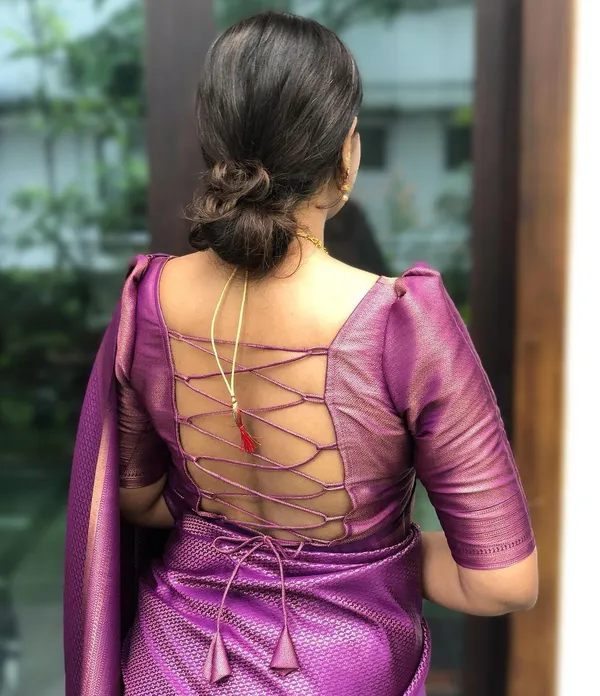 Royal_Purple_Woven_Silk_Blend_Saree_With_Rose_Gold_Border_And_Tasselled_Pallu