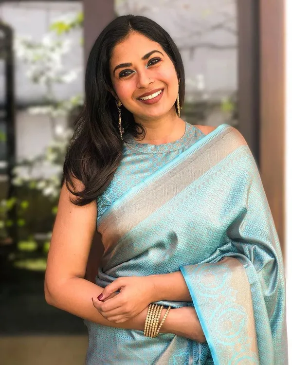 Sky_Blue_Woven_Silk_Blend_Saree_With_Beige_Floral_Pallu_And_Contrast_Border