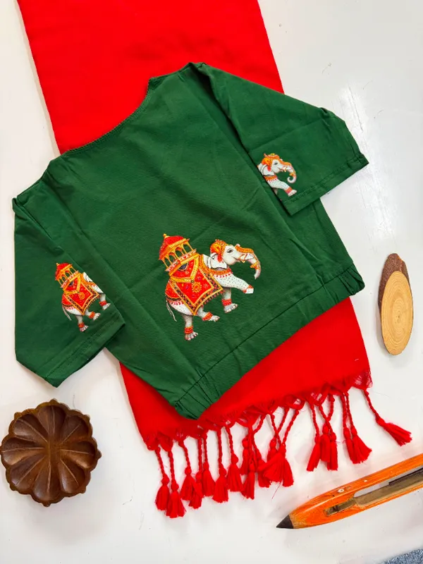 Elegant_Red_Saree_With_Embroidered_Green_Blouse_Tassel_Pallu