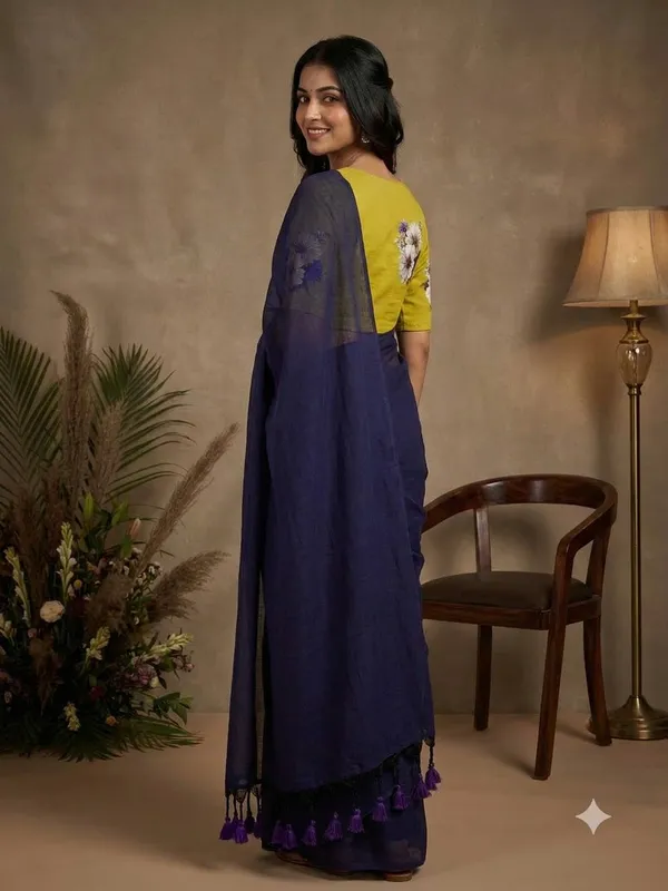 Elegant_Navy_Blue_Saree_With_Mustard_Floral_Blouse_Tassel_Pallu