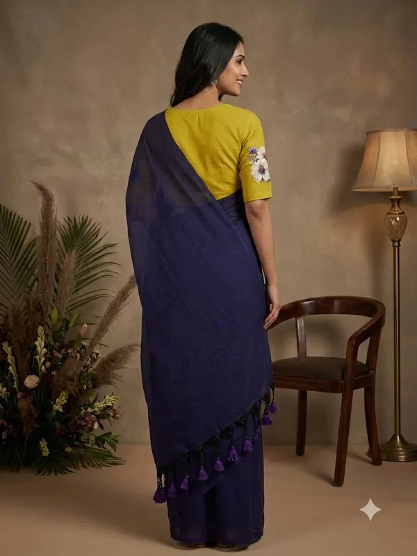 Elegant_Navy_Blue_Saree_With_Mustard_Floral_Blouse_Tassel_Pallu