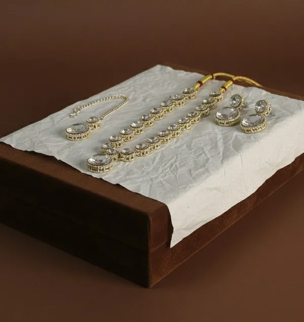White_Stone_Studded_Gold_Tone_Necklace_Maang_Tikka_Set_For_Women