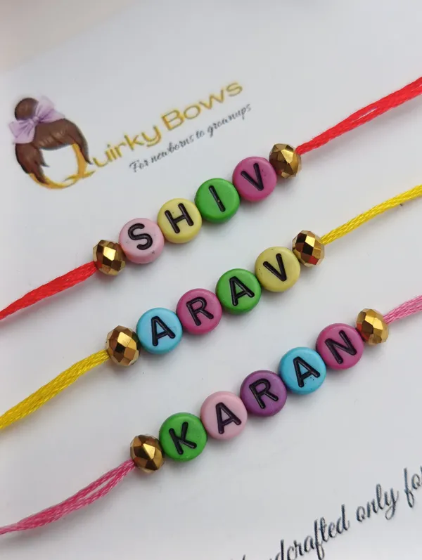 Multicolor_Thread_Alphabet_Bead_Personalised_Rakhi_Set_Pack_Of_2
