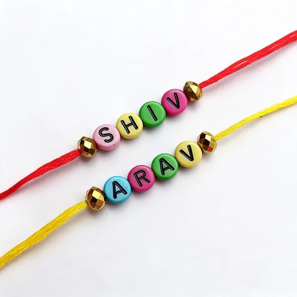 Multicolor_Thread_Alphabet_Bead_Personalised_Rakhi_Set_Pack_Of_2