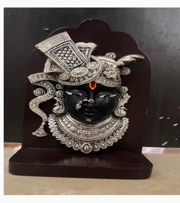 Black_Deity_Idol_With_Ornate_Silver_Embellishments