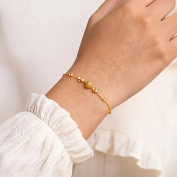 Gold_Alloy_Floral_Bead_Chain_Bracelet_For_Women