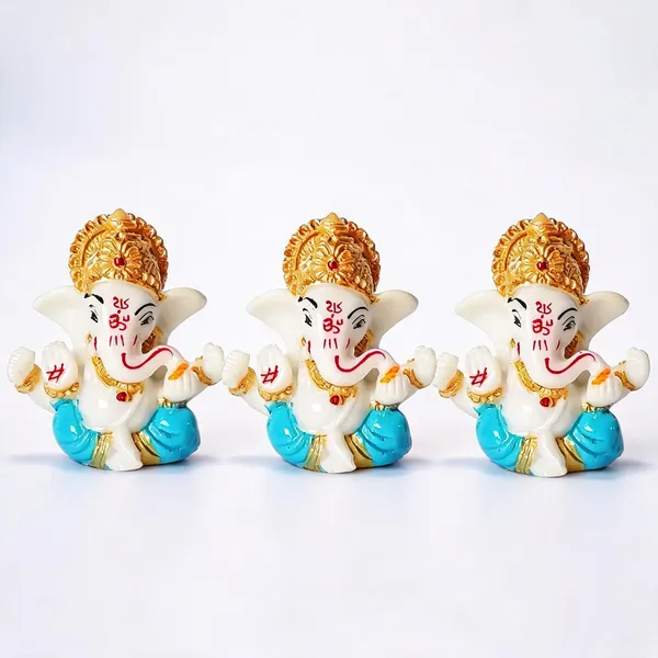 Krishan_Lord_Ganesha_Idol_â€“_White_&_Blue_Decorative_Showpiece_-_7_cm_(Resin,_White,_Blue)_-_Pack_of_3