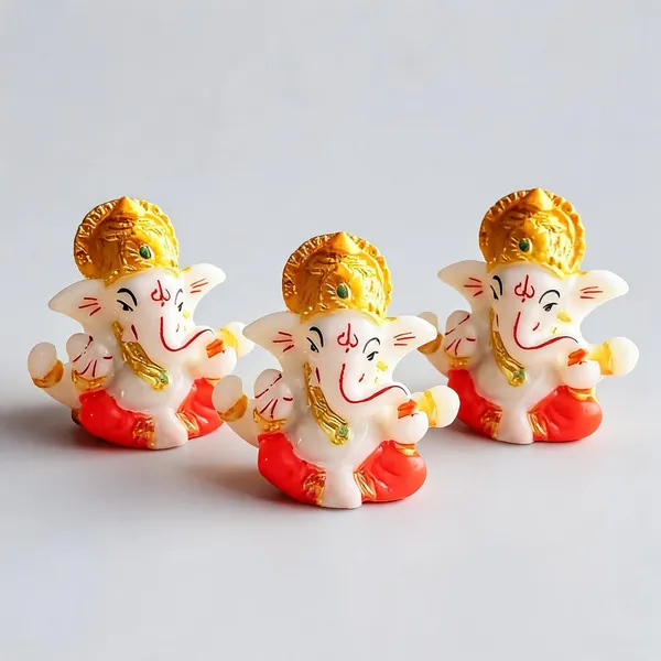 Krishan_Lord_Ganesha_Idol_â€“_White_with_Red_Attire_Decorative_Showpiece_-_6_cm_(Resin,_White,_Orange)_-_Pack_of_3