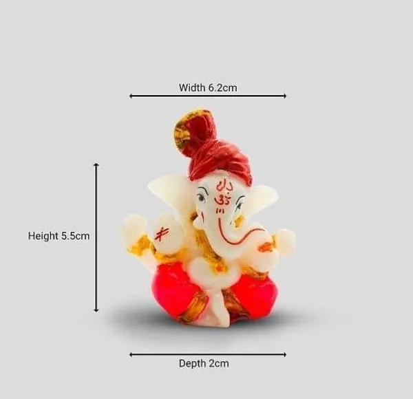 Krishan_Lord_Ganesha_Idol_with_Red_Pagdi_Decorative_Showpiece__-__5.5_cm_(Resin,_White,_Red)