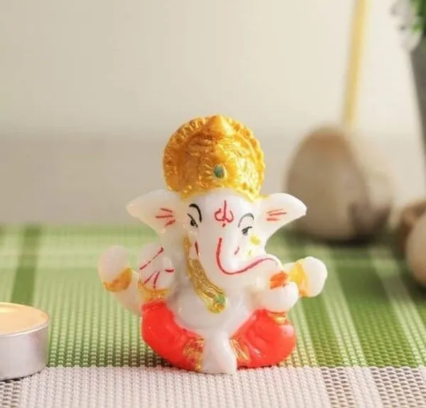 Krishan_Lord_Ganesha_Idol_–_White_with_Red_Attire_Decorative_Showpiece__-__6_cm_(Resin,_White,_Orange)