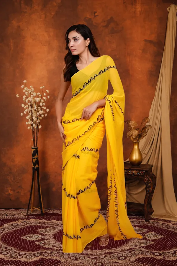 Sunshine_Yellow_Linen_Saree_With_Black_Warli_Art_Border