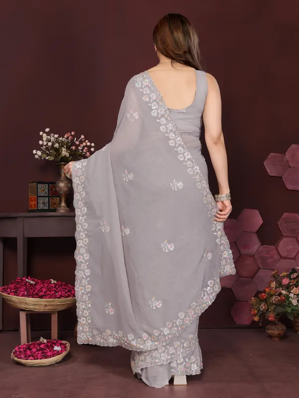 Georgette_Silk_Saree_with_Intricate_Embroidery_Work_&_Matching_Embroidered_Blouse_Piece