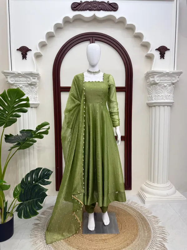 Green_Color_Beautiful_Gown_In_Silk_Fabric