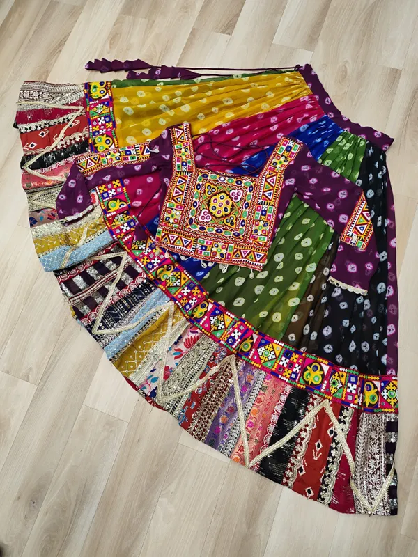 Navratri_Lehenga_Choli_in_Georgette_print_and_attractive_combination_of_wintage_and_gamthi_embellished_work_