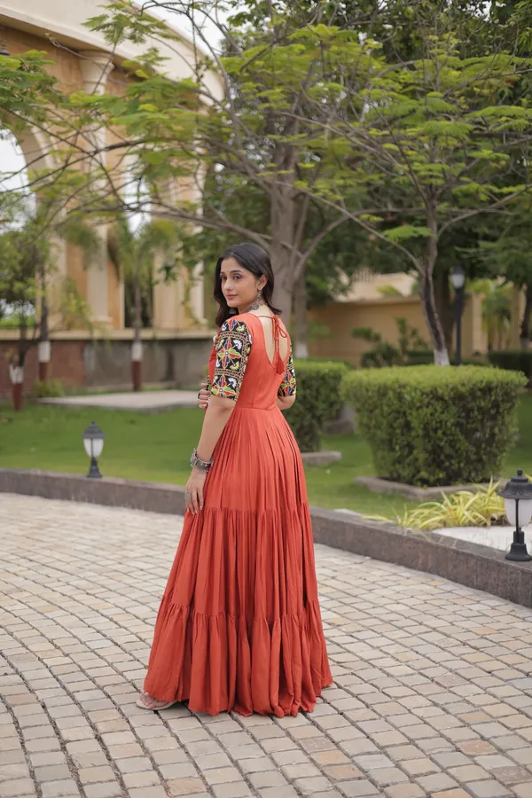 Orange_Color_Beautiful_Navratri_Gown_Collection_in_Rayon_Fabric_with_12_Meter_Flair