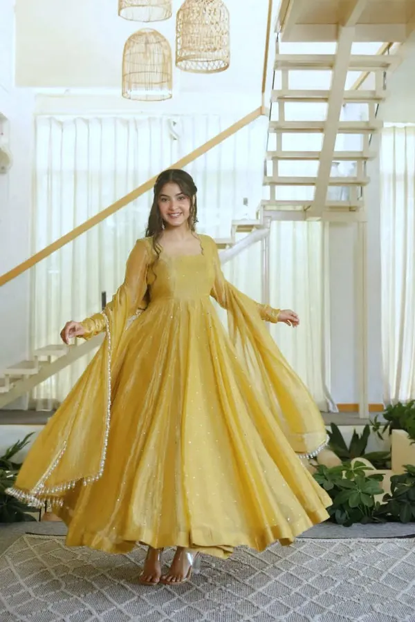 Yellow_Color_Beautiful_Gown_in_Silk_Fabric