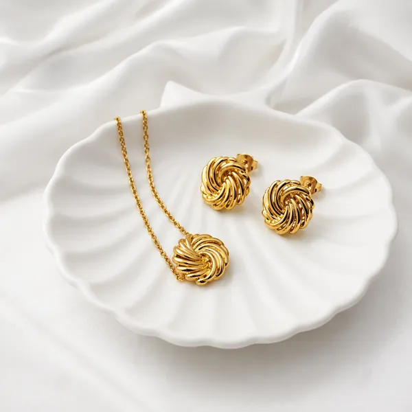 Golden_Stainless_Steel_Swirl_Pendant_Set_For_Women