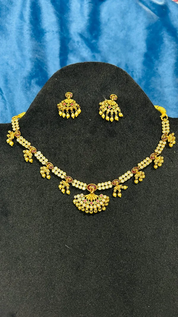 Gold_Alloy_Red_Stone_Floral_Traditional_Necklace_Set_For_Women