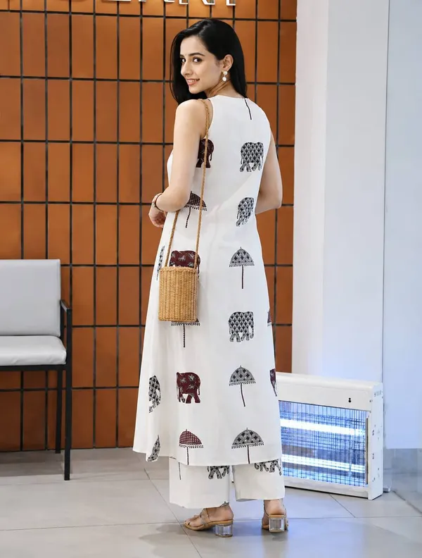 Cream_Rayon_Sleeveless_Elephant_&_Umbrella_Print_Maxi_Dress_For_Women