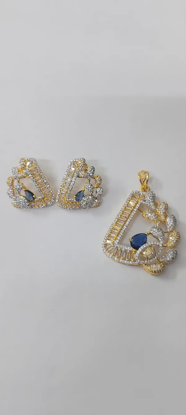 AD_Gold_Tone_Pendant_Set_with_Blue_Stone_and_Earrings
American_Diamond,_Pear_Cut_Blue_Stone,_Baguette_Accents,_Matching_Earrings,_Festive_Jewellery