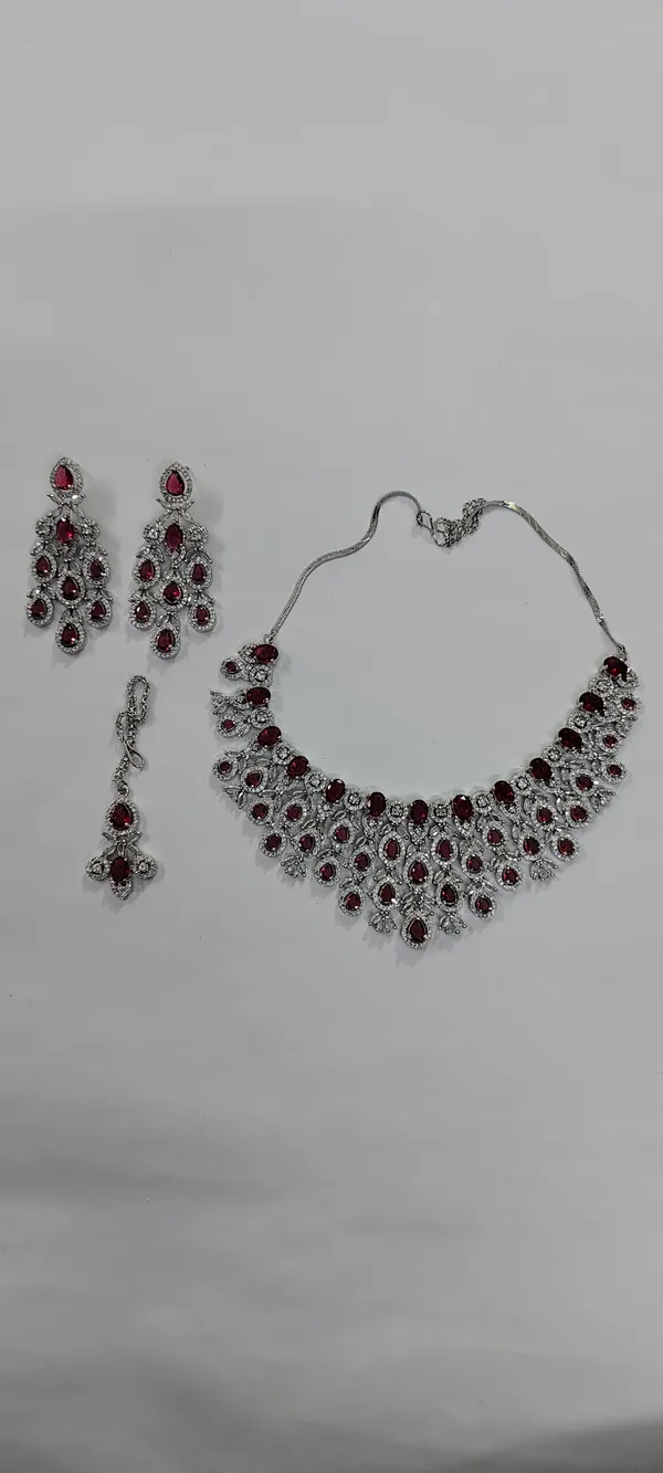 Silver_Tone_Red_Stone_Necklace_Set_With_Earrings_And_Maang_Tikka