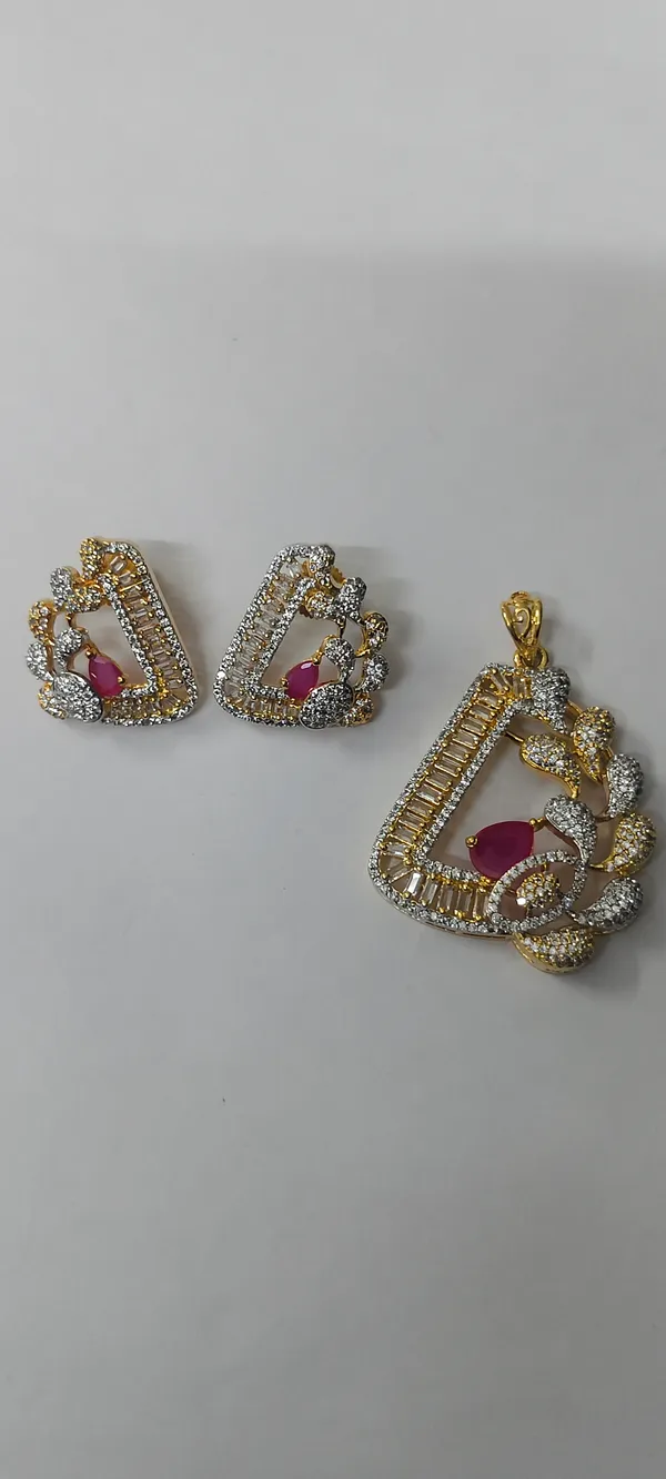 AD_Gold_Tone_Pendant_Set_with_Pink_Ruby_and_Earrings
American_Diamond,_Pear-Cut_Ruby_Stone,_Matching_Earrings,_Gold_Tone_Finish,_Floral_Design