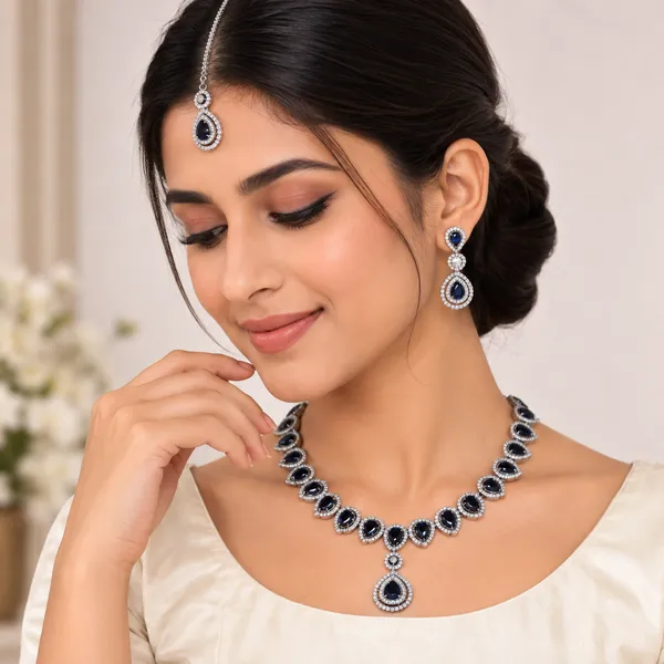 AD_String_Necklace_Set_with_Blue_Stones,_Earrings_and_Tika
Pendant_Style,_Silver_Tone_Finish,_Teardrop_Stones,_3-Piece_Set,