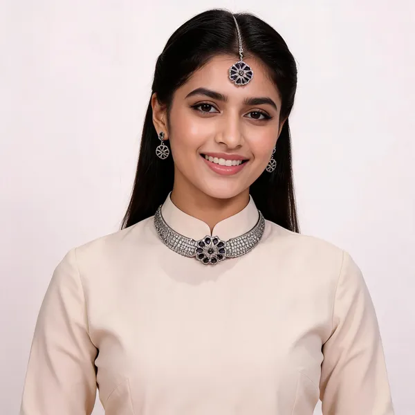 AD_Choker_Necklace_Set_with_Blue_Sapphire_Floral_Detail
Includes_Earrings_&_Tika,_Brooch-Style_Centre,_Silver_Tone_Finish,_Cubic_Zirconia