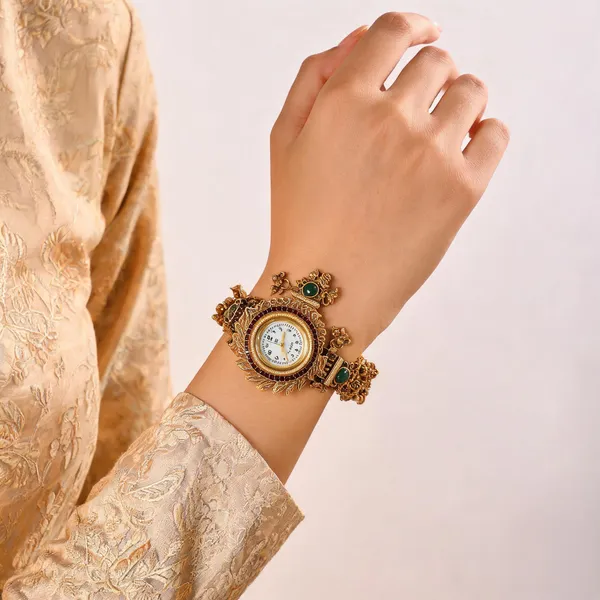 Gold_Tone_Ornate_Bracelet_Watch_With_Green_Stone_Details