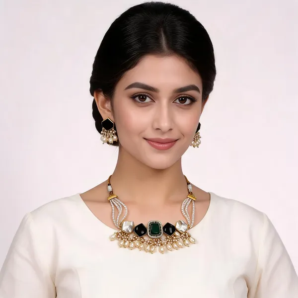 Multi_string_pearl_necklace_with_5_stone_setting_in_mother_of_pearl_and_moissanite_(black_and_green)._Tear_drop_pearl_hangings_and_gold_finish._With_matching_earrings