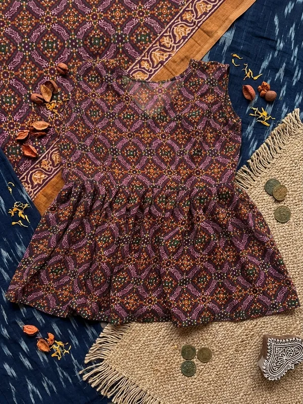 Maroon_Polyester_Flared_Short_Kurti_For_Women