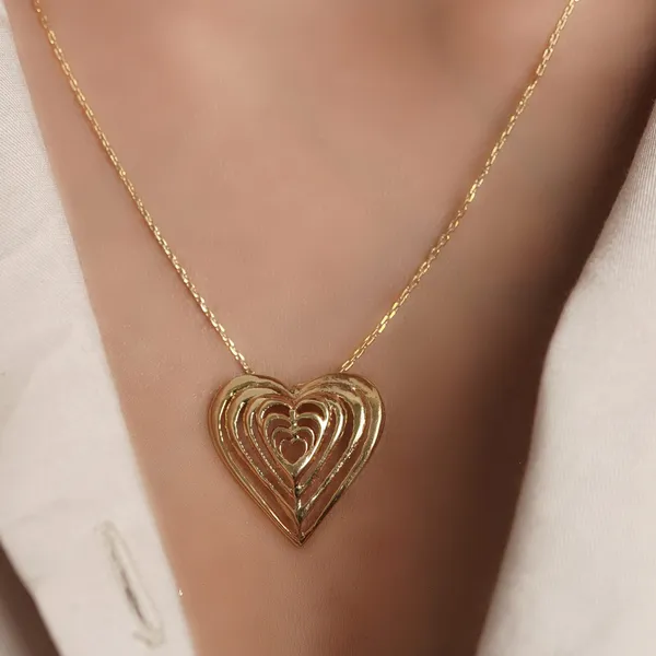 Hearts_In_Race_Pendant