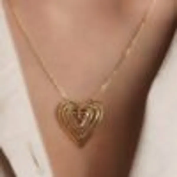 Hearts_In_Race_Pendant
