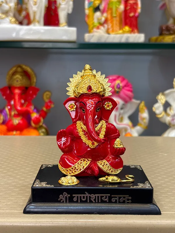 Red_Decorative_Lord_Ganesha_Idol_With_Golden_Detailing