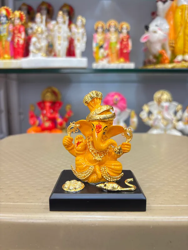 Orange_Traditional_Ganesha_Idol_With_Black_Base