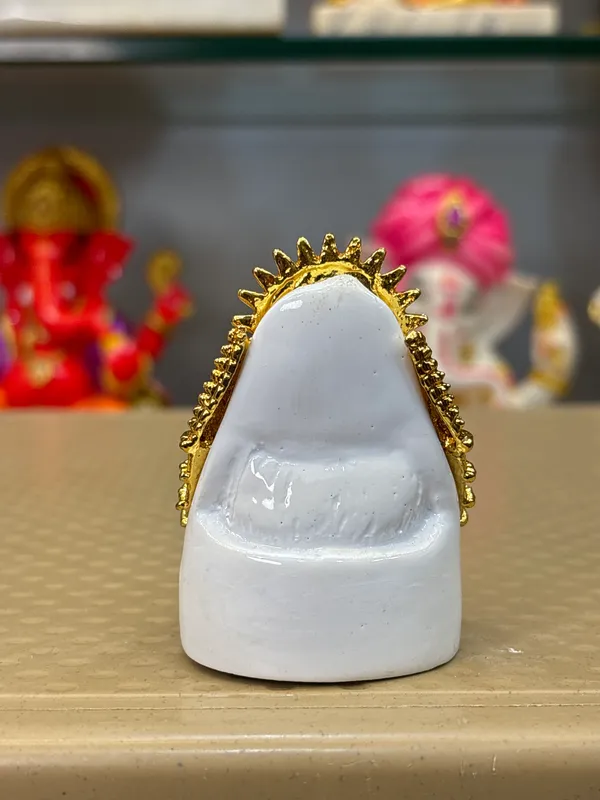 Gold_Tone_Ornate_Hindu_Deity_Figurine_With_White_Base