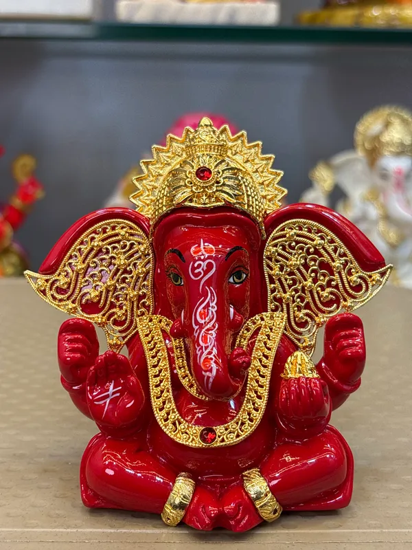 Red_Decorative_Lord_Ganesha_Idol_With_Golden_Detailing