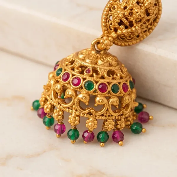 Antique_Gold_Goddess_Lakshmi_Temple_Jhumka_Earrings_With_Ruby_Emerald_Stones